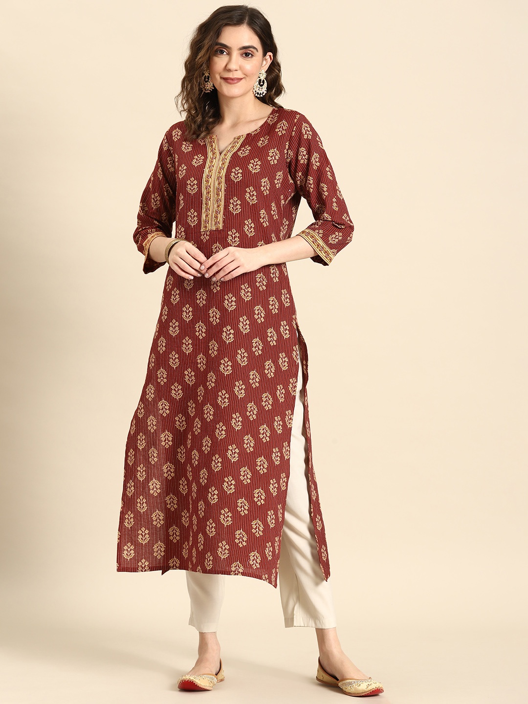 

Nayo Women Floral Printed Thread Work Cotton Kurta, Maroon