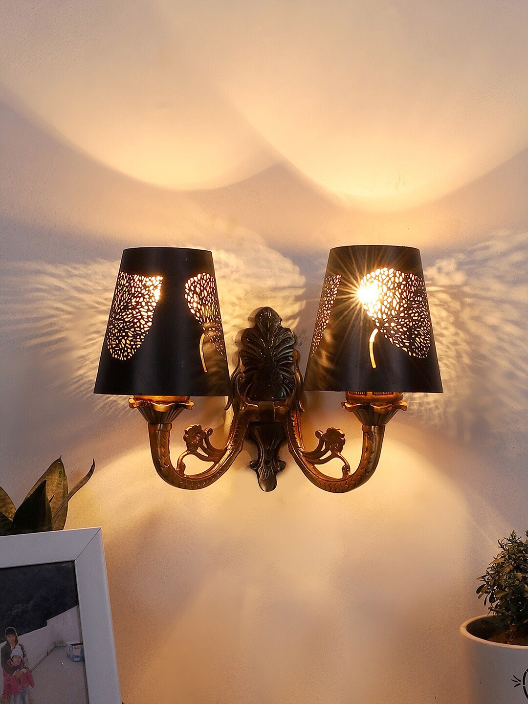 

Devansh Black Textured Dual Wall Lamp With Etching Lamp Shade, Gold
