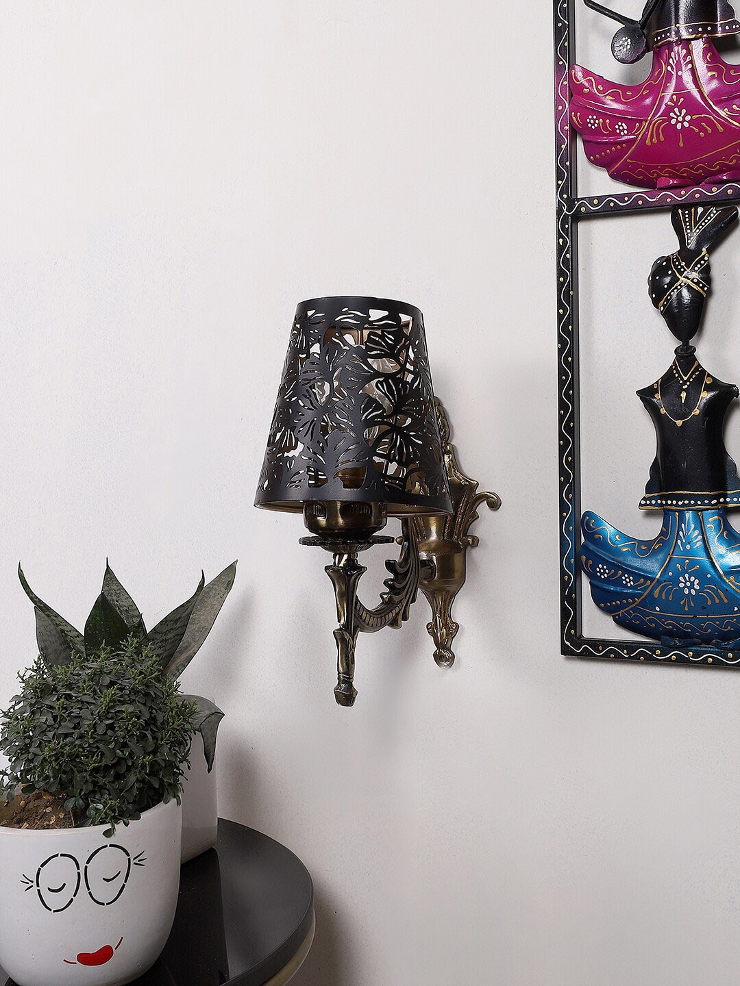 

Devansh Gold Toned & Black Textured Antique Wall Lamp With Etching Lamp Shade