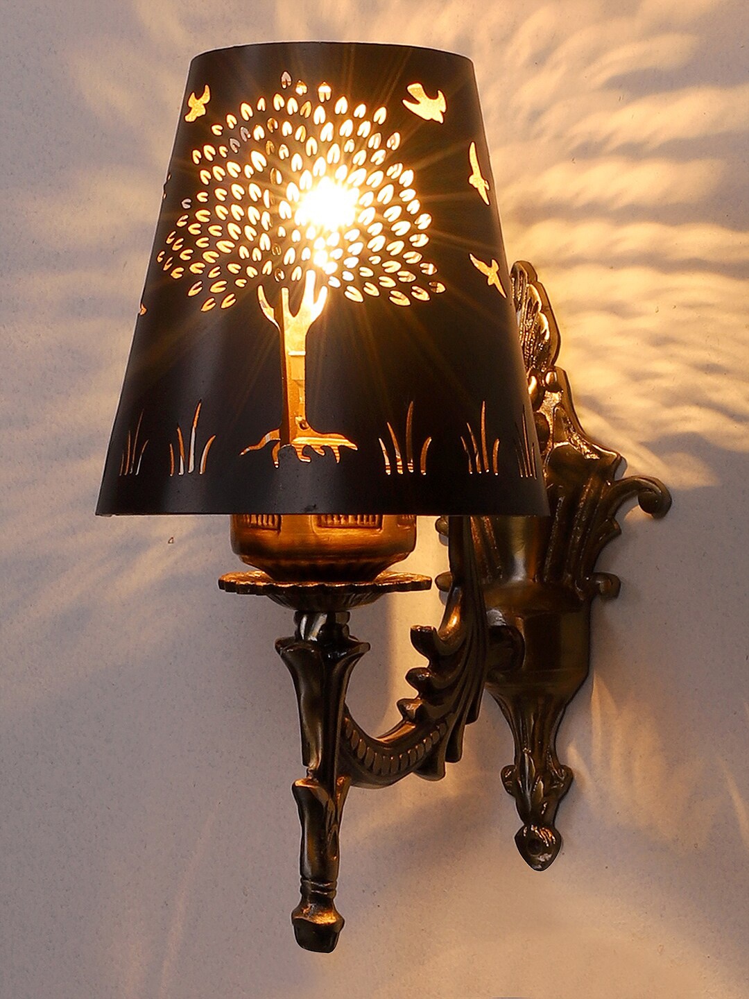 

Devansh Gold Toned & Black Textured Antique Wall Lamp With Etching Lamp Shade