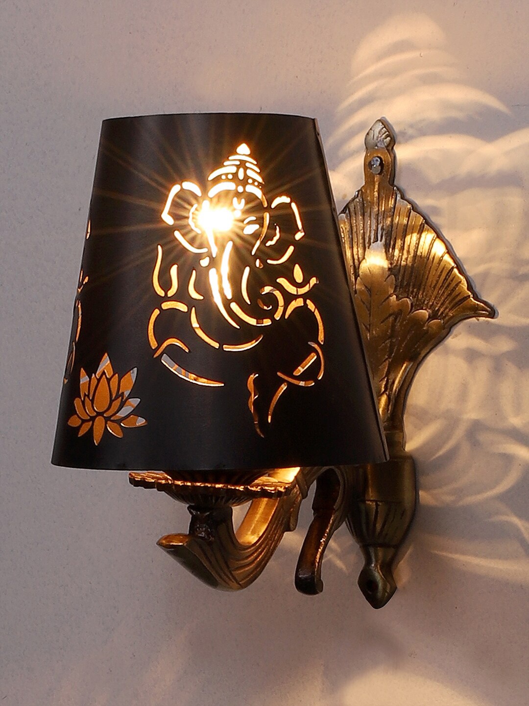 

Devansh Black Textured Antique Wall Lamp With Etching Lamp Shade, Gold