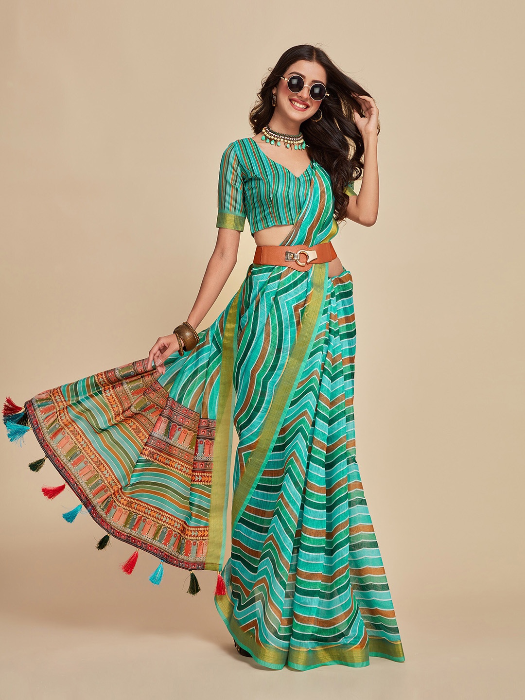 

Sangria Turquoise Blue & Yellow Abstract Printed Tasseled Zari Saree