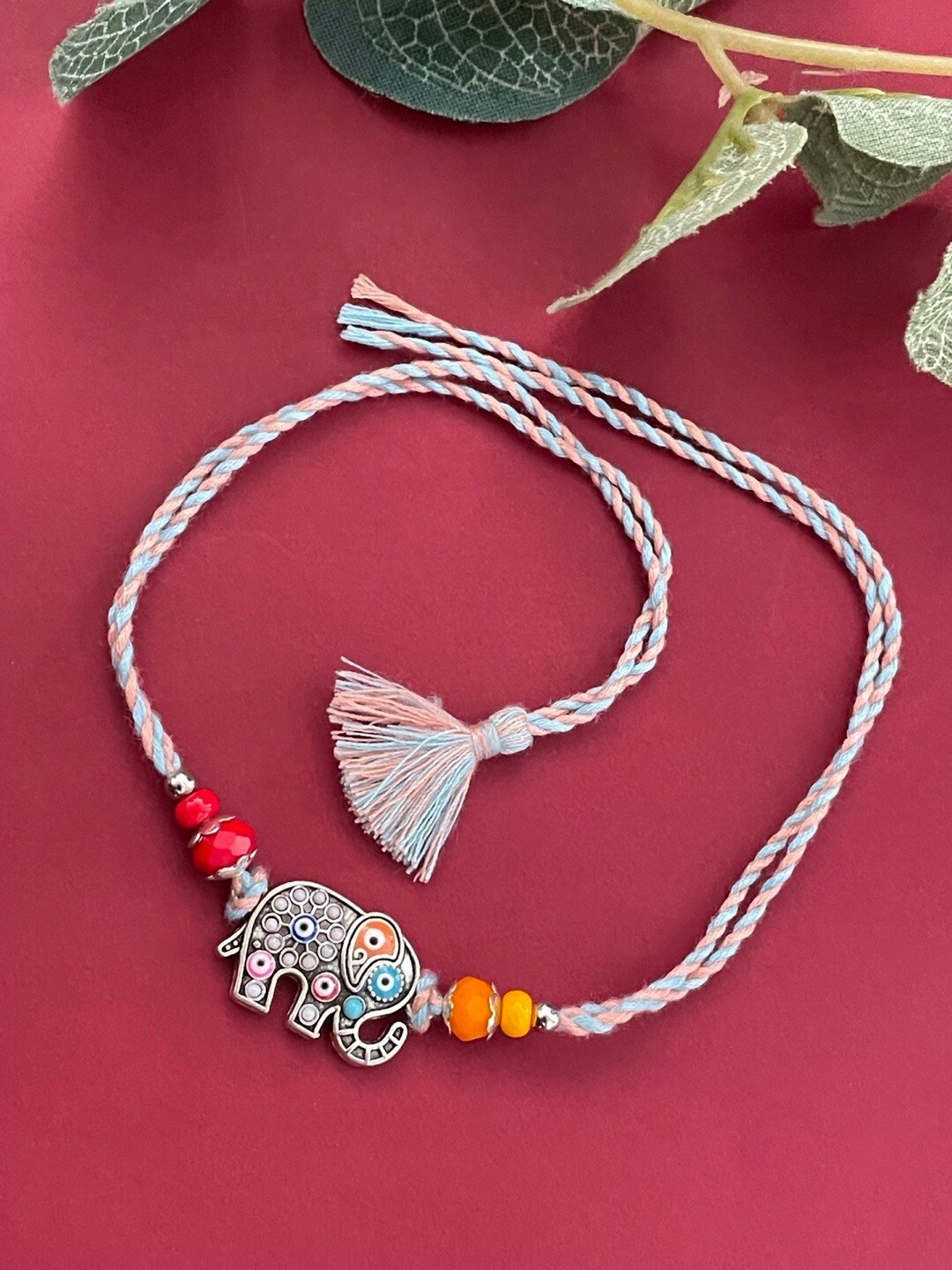 

Digital Dress Room Evil Eye Elephant Charm Rakhi, Silver