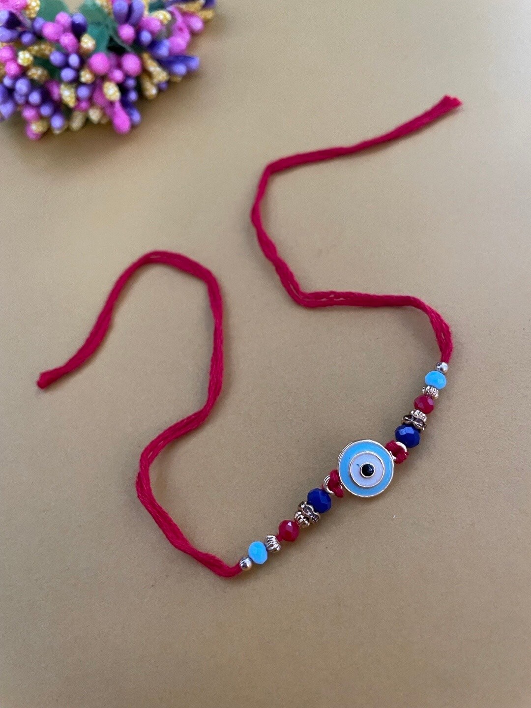 

Digital Dress Room Gold-Plated Evil Eye & Thread Rakhi, Blue