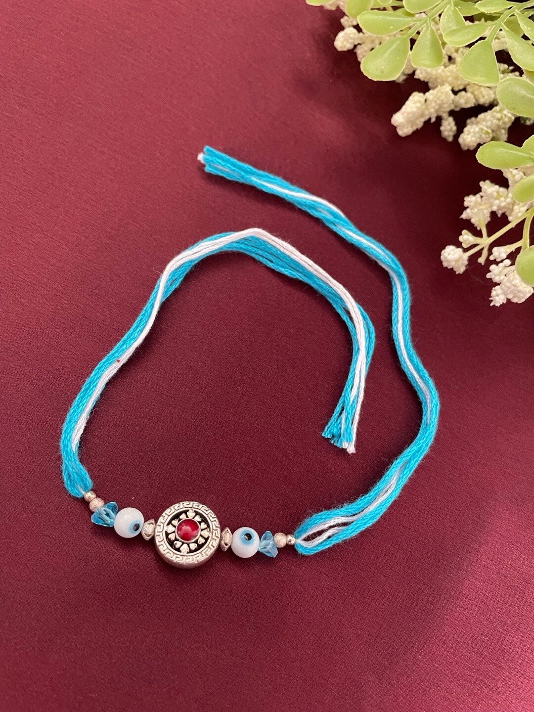 

Digital Dress Room Silver-Plated Stone Studded Tibetan Evil Eye Design Thread Rakhi