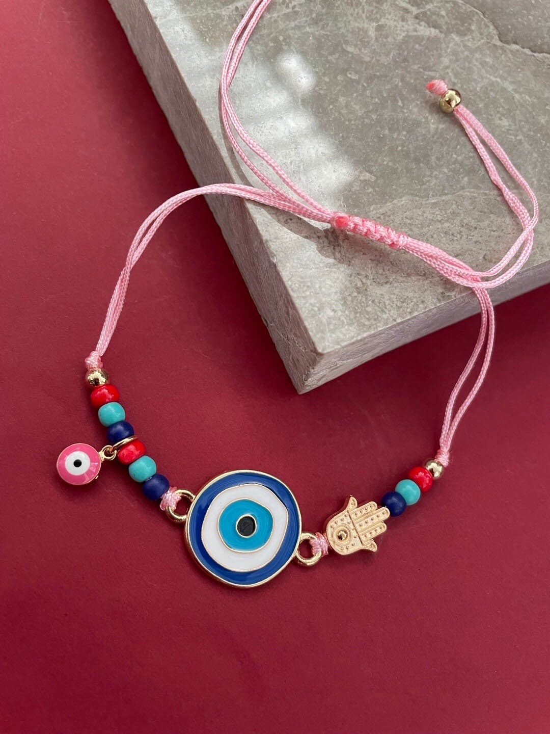 

Digital Dress Room Evil Eye & Beaded Thread Rakhi, Pink