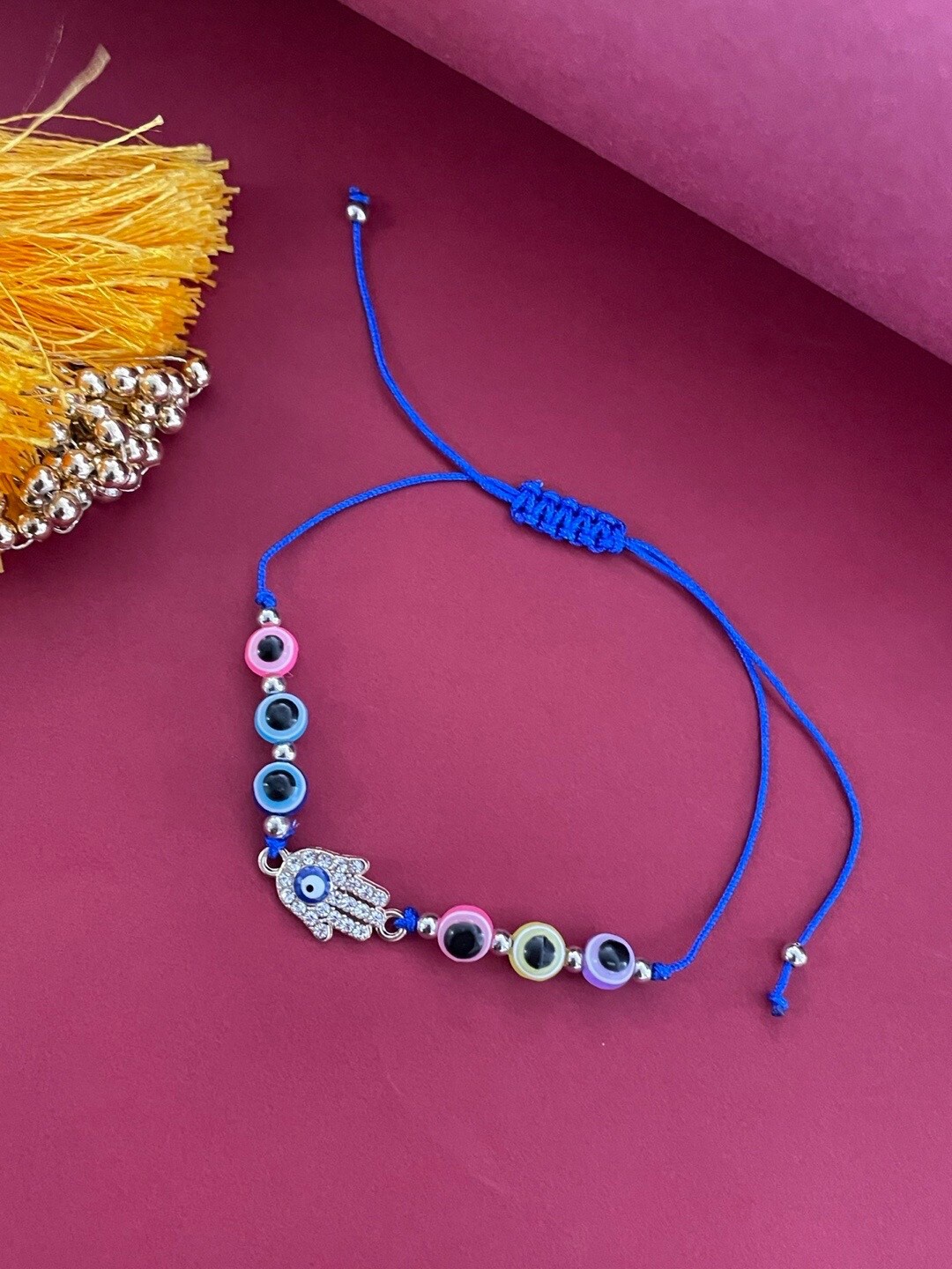 

Digital Dress Room Evil Eye & Beaded Charm Rakhi, Blue