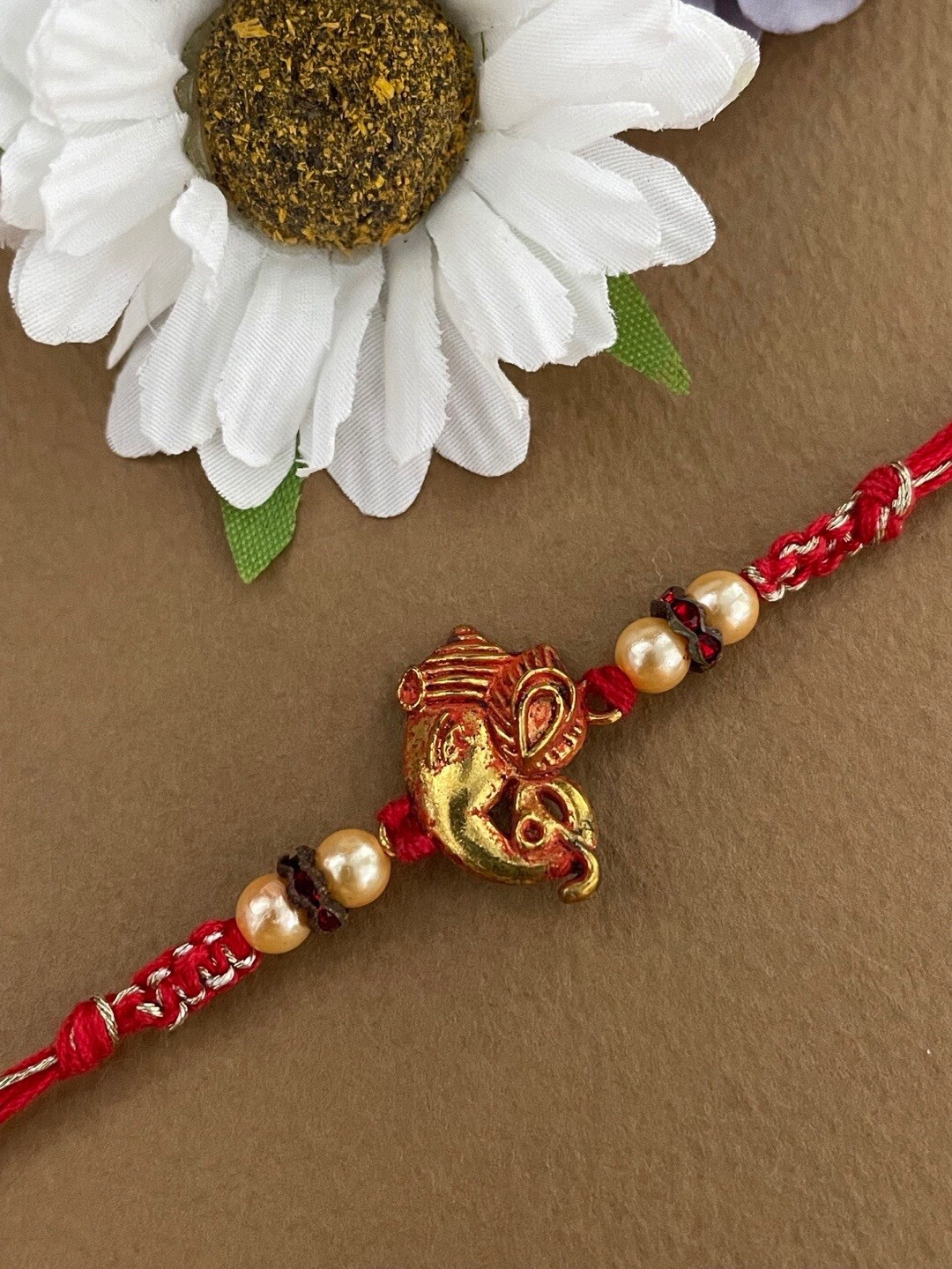 

Digital Dress Room Ganesha & Beaded Thread Rakhi, Gold