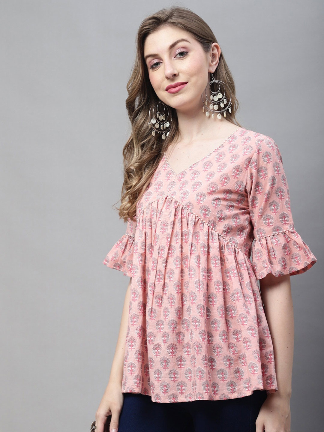 

Rajnandini Ethnic Motifs Printed Bell Sleeve Cotton Top, Peach