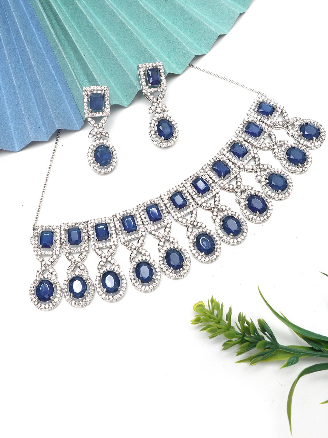 

Ozanoo Silver-Plated American Diamond Studded Jewellery Set