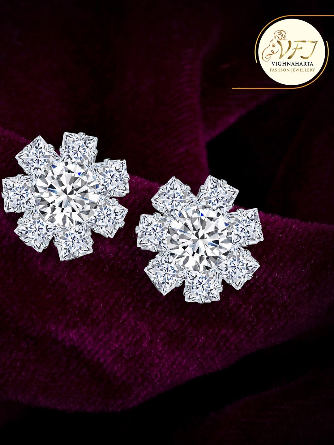 

Vighnaharta Rhodium-Plated Floral Studs Earrings, Silver