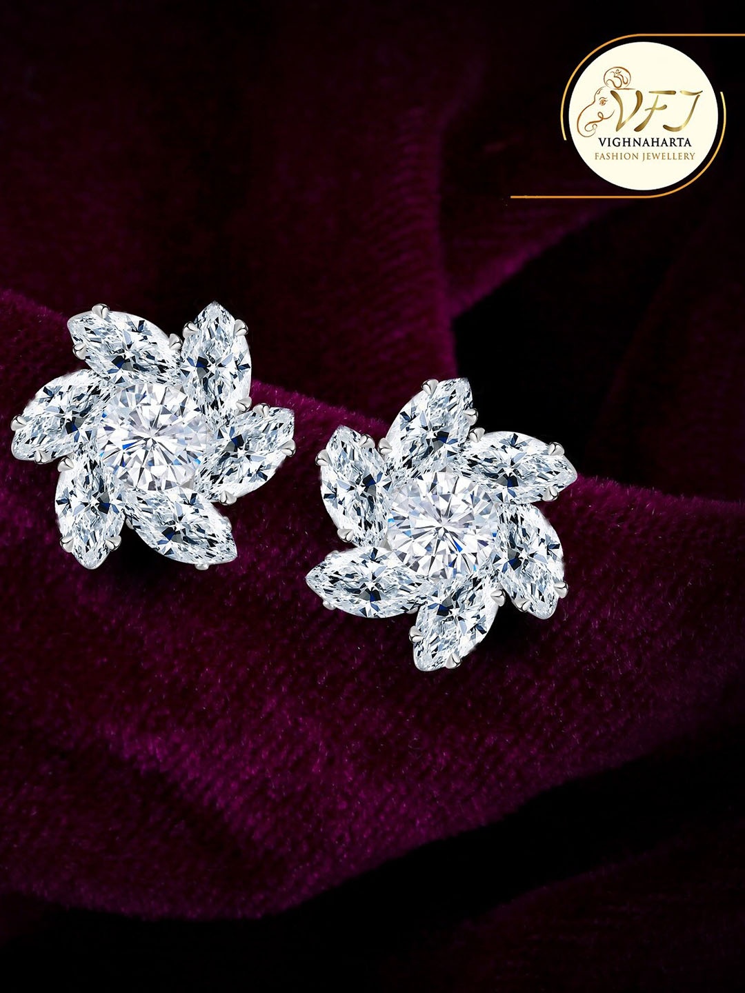 

Vighnaharta Rhodium Plated Floral Studs Earrings, Silver