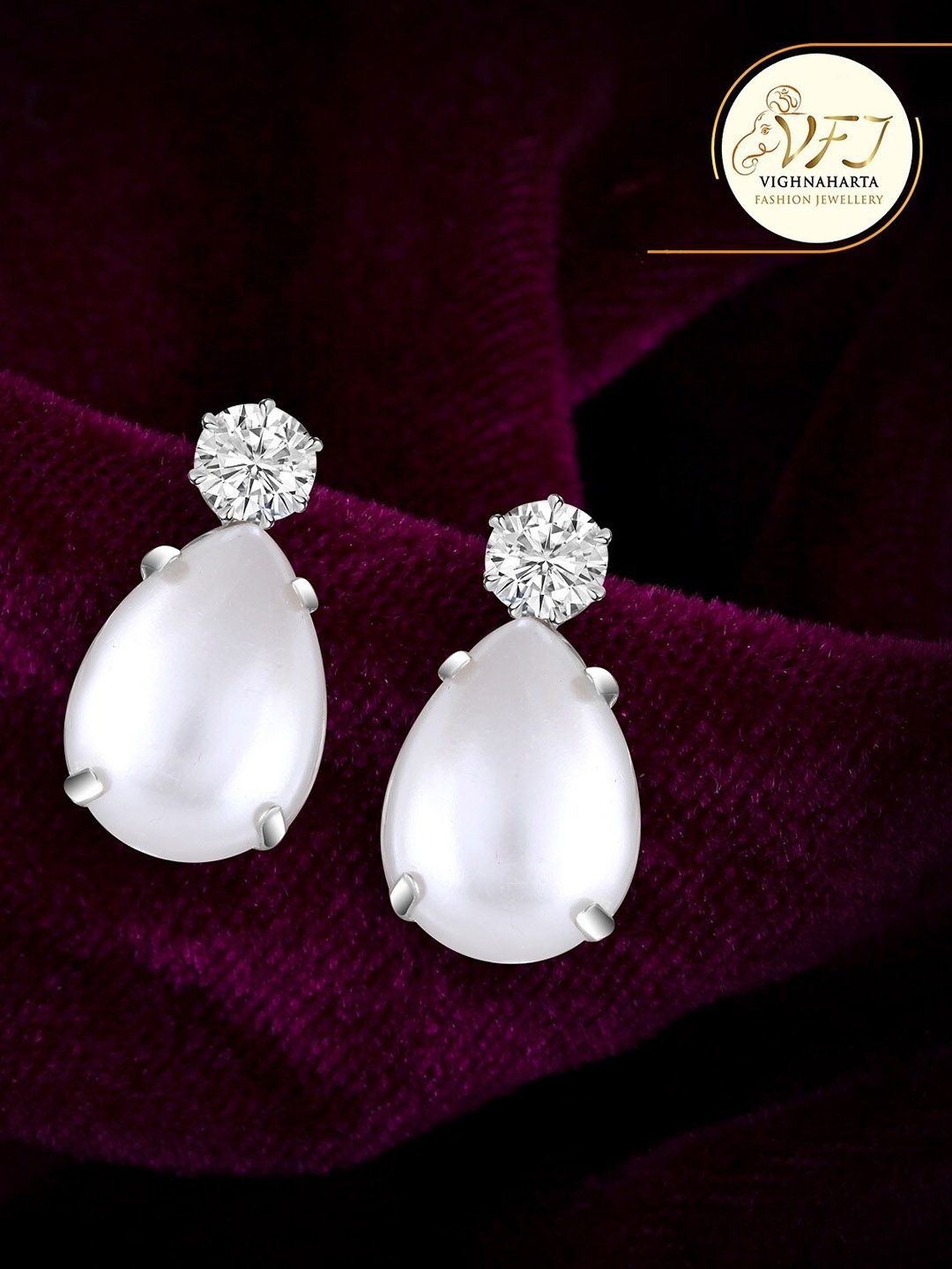 

Vighnaharta Rhodium-Plated Teardrop Shaped Drop Earrings, Silver