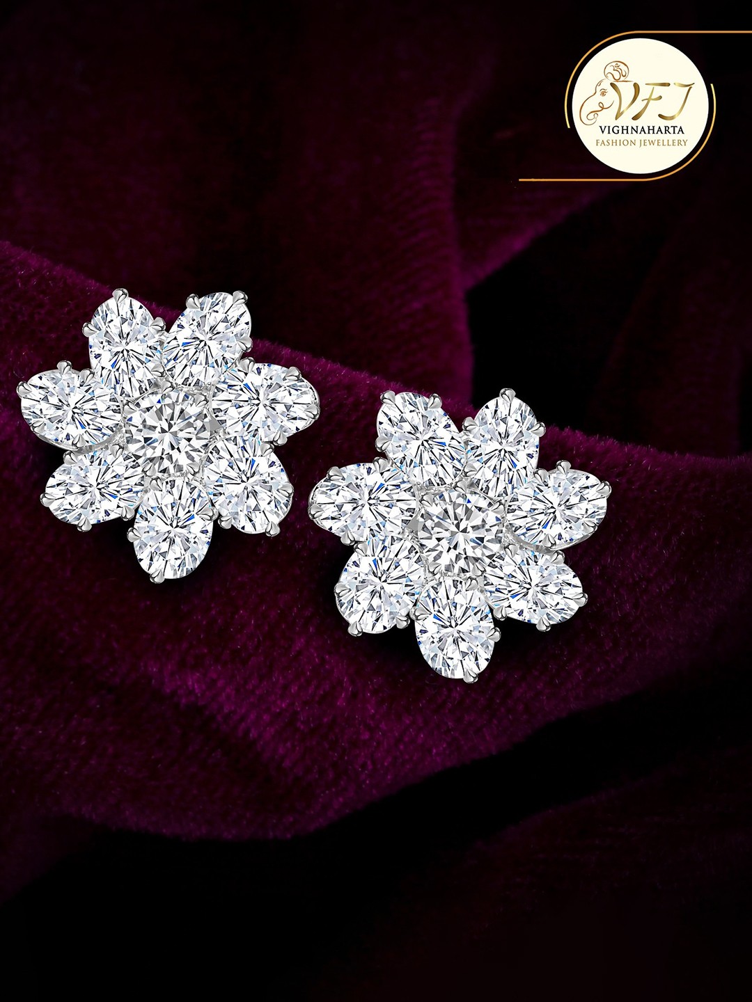 

Vighnaharta Rhodium-Plated Floral Studs Earrings, Silver