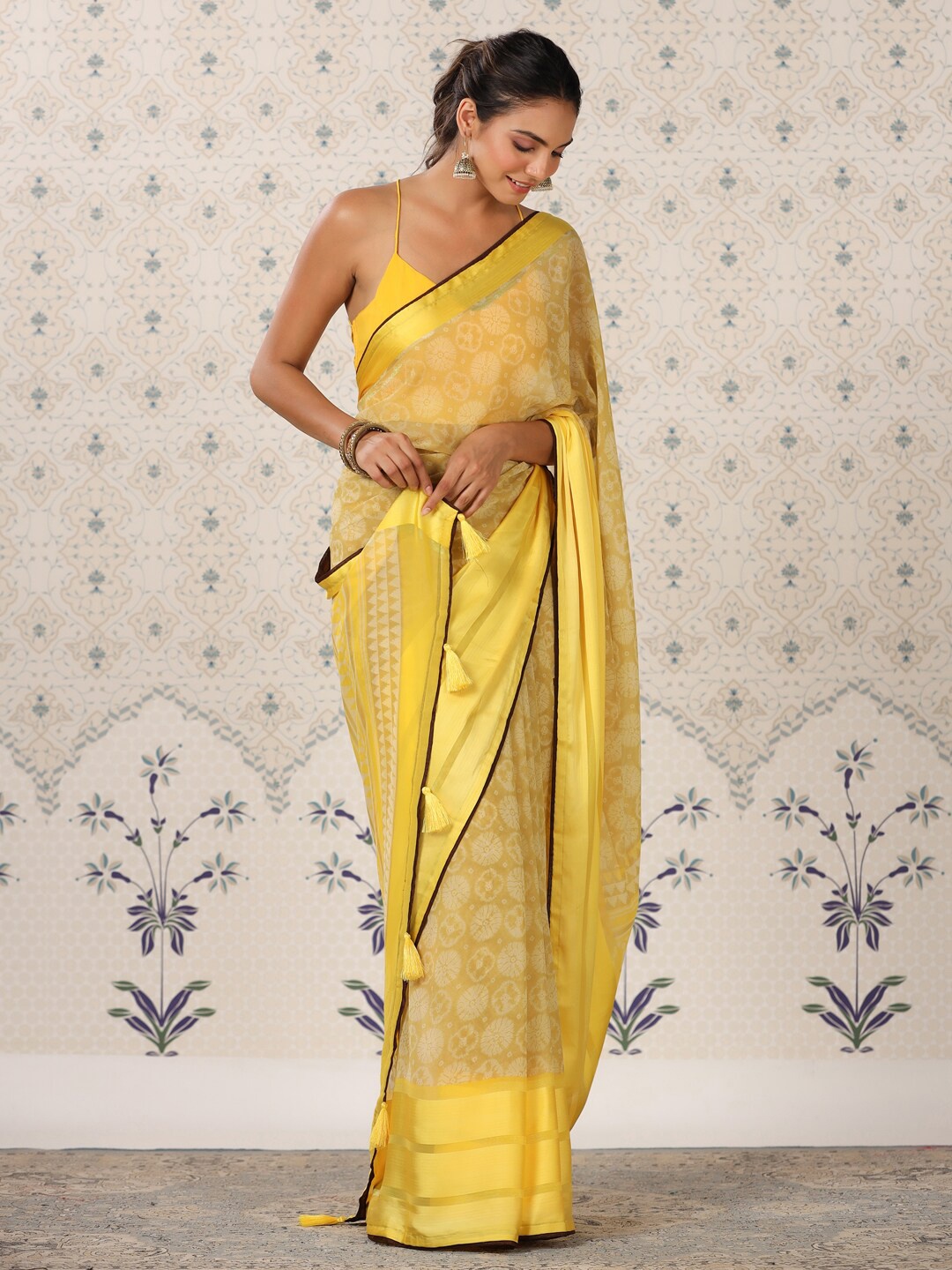 

Ode by House of Pataudi Yellow & White Ethnic Motifs Printed Pure Georgette Saree