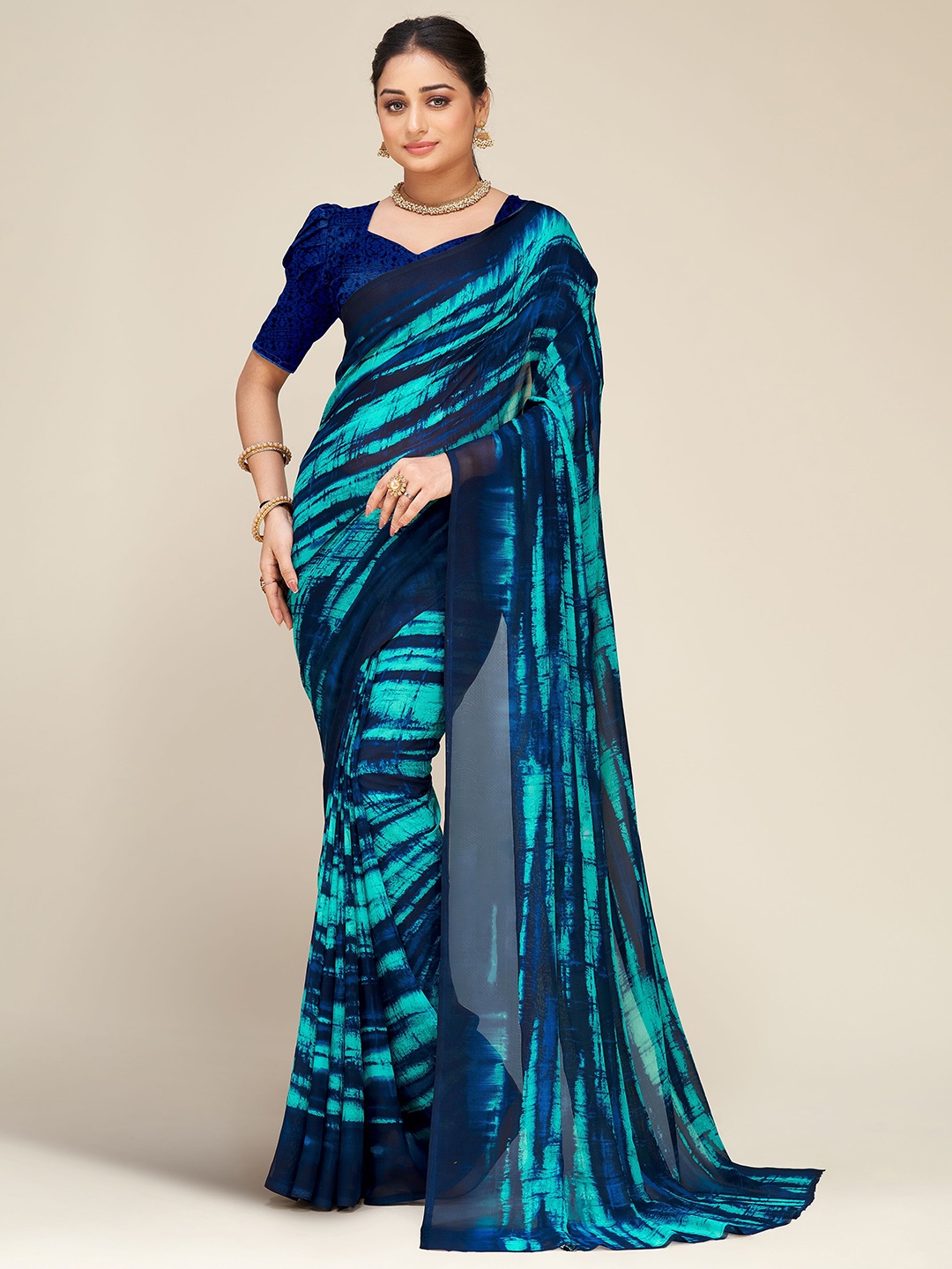 

Ambuja International Tie and Dye Pure Georgette Saree, Blue