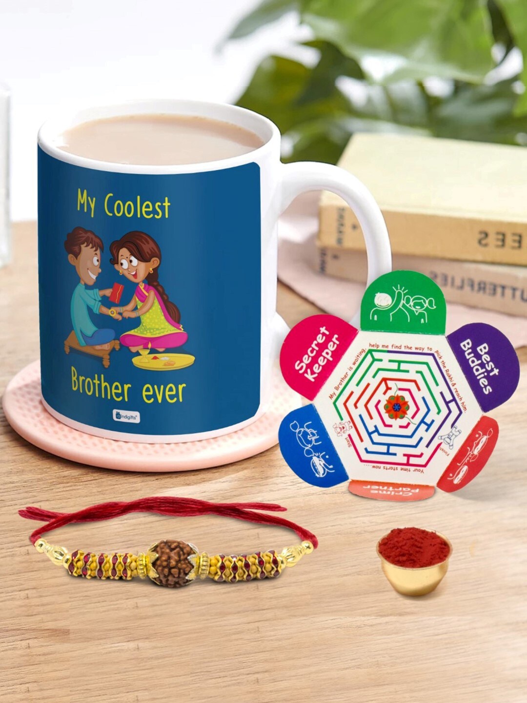 

Indigifts Rudraksha Rakhi With Printed Coffee Mug, Blue