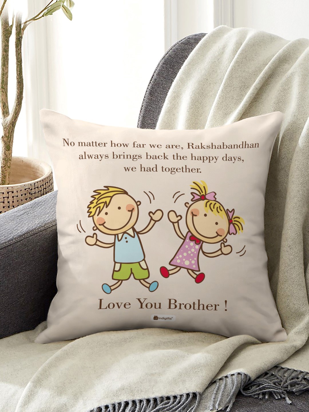 

Indigifts Off White Far But Always Close Printed Cushion and Rakhi Gift Set