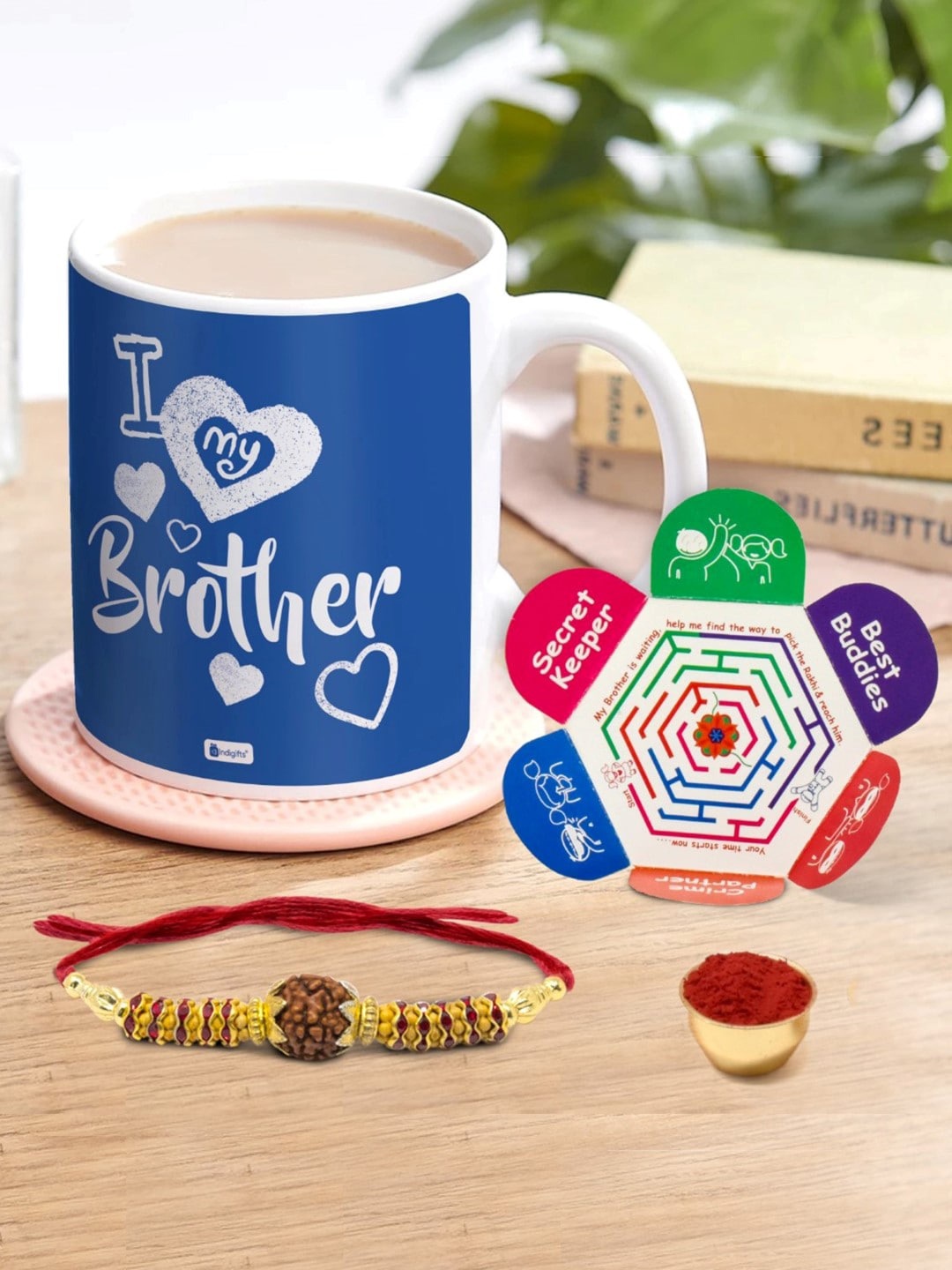 

Indigifts Rudraksha Rakhi With Printed Coffee Mug, Blue