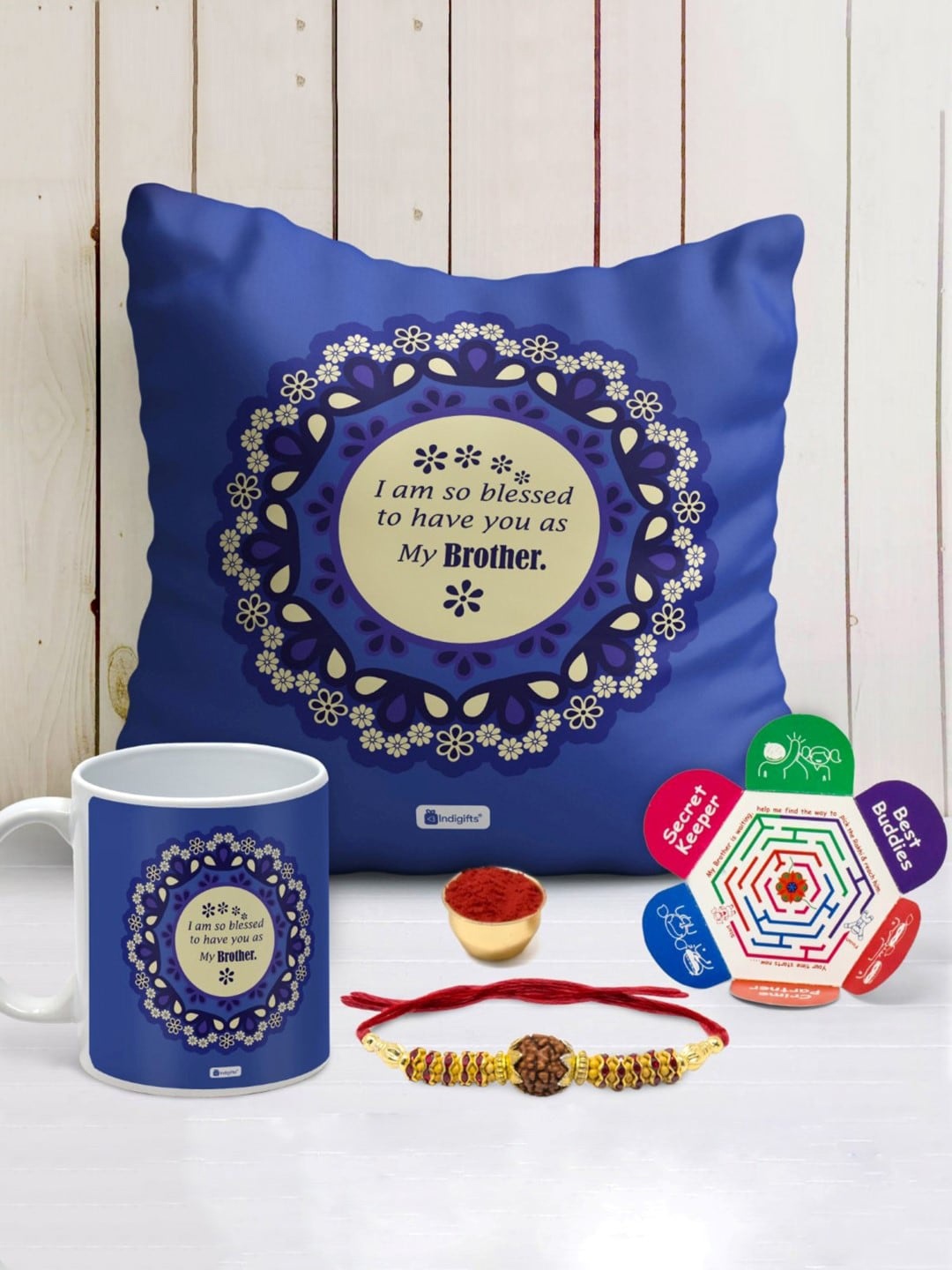 

Indigifts Rudraksha Rakhi With Printed Cushion & With Coffee Mug, Blue