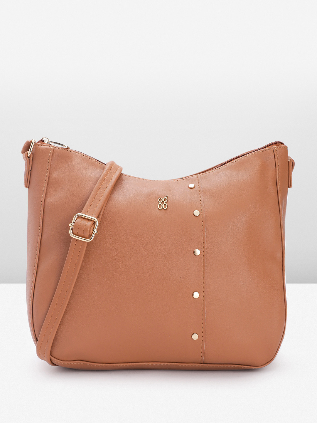 

Baggit Women Solid Sling Bag, Brown