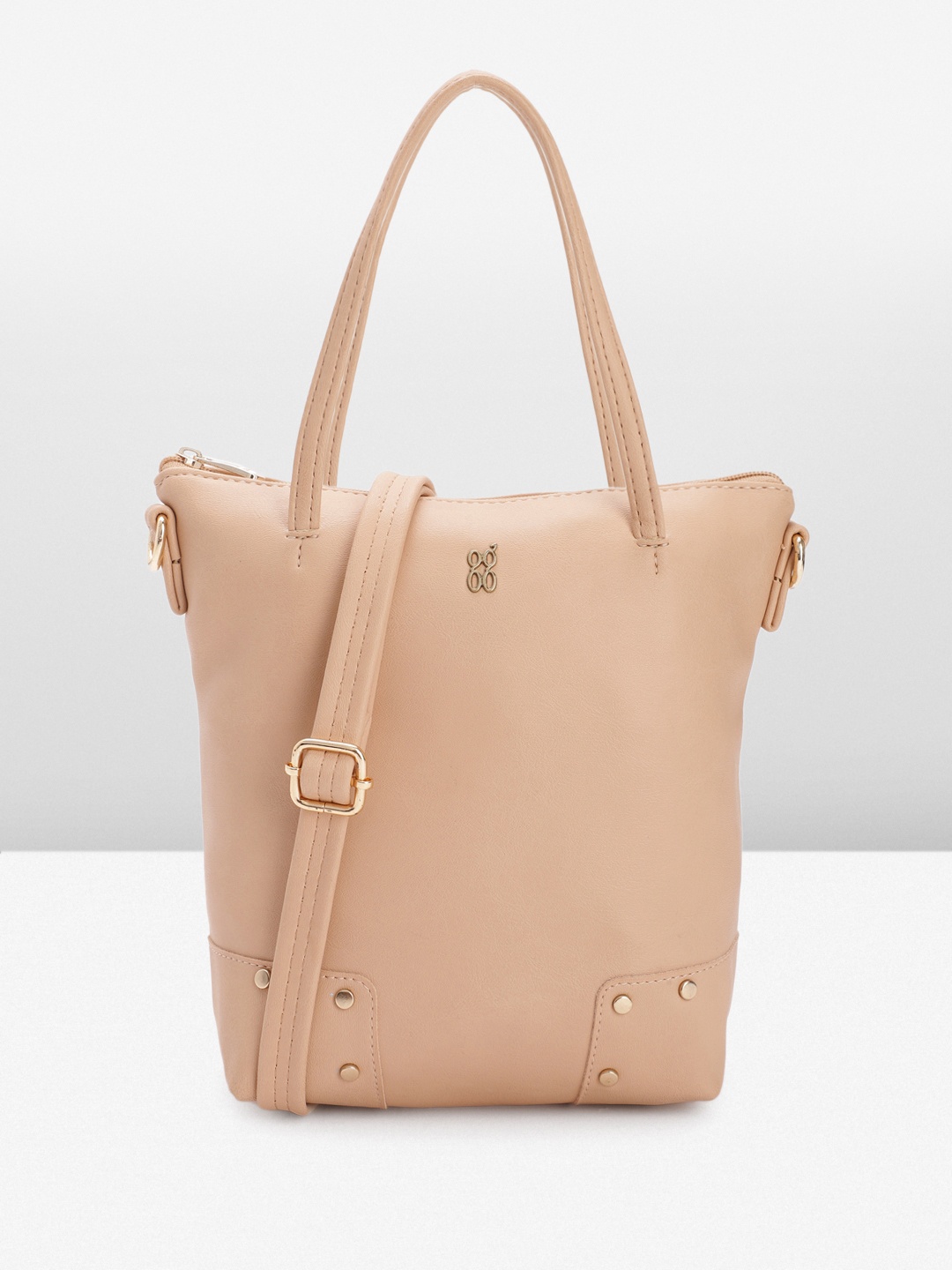 

Baggit Solid PU Structured Handheld Bag With Minimal Studded Detail, Peach