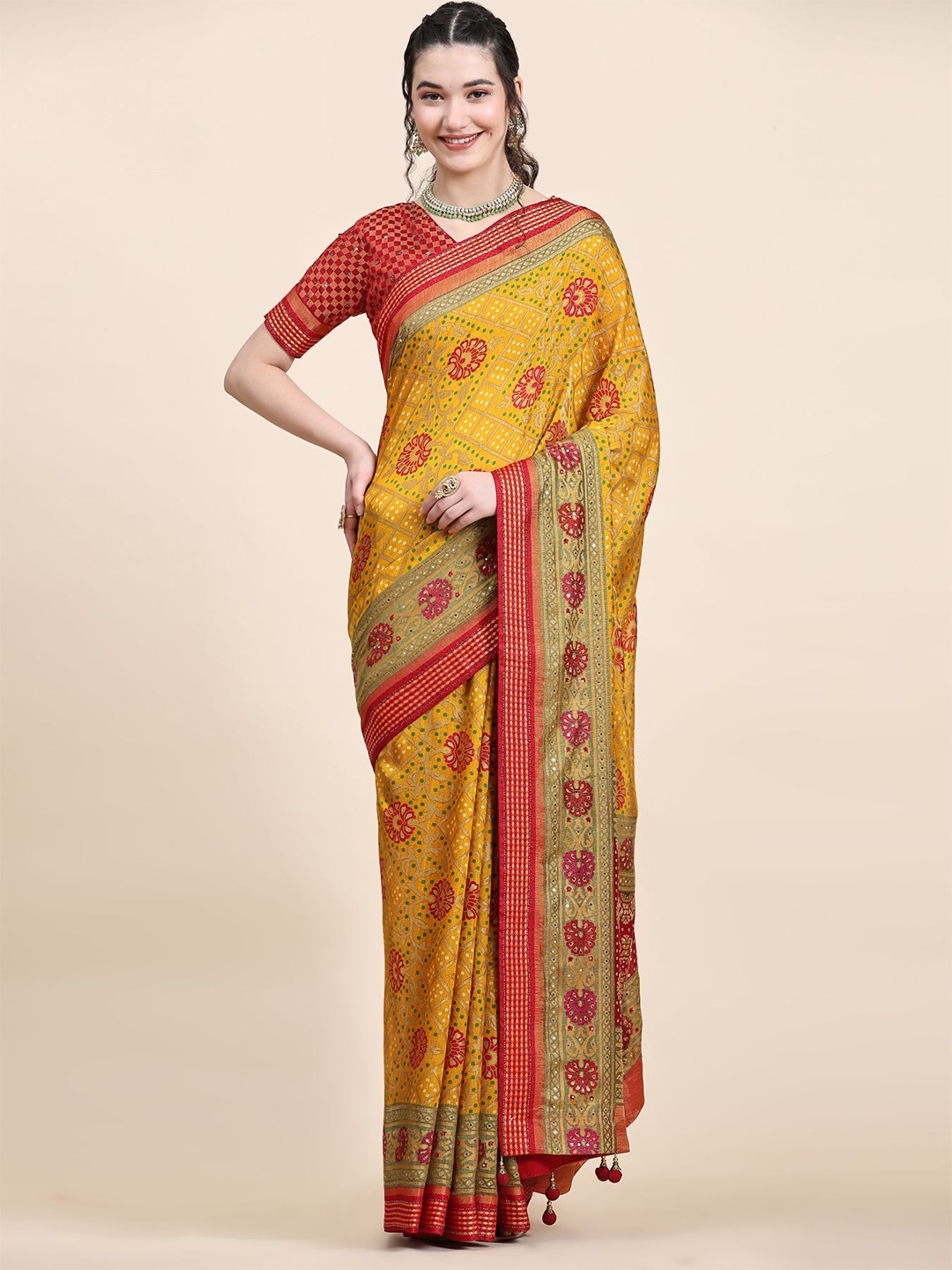 

Phenav Ethnic Motifs Printed Art Silk Patola Saree, Yellow