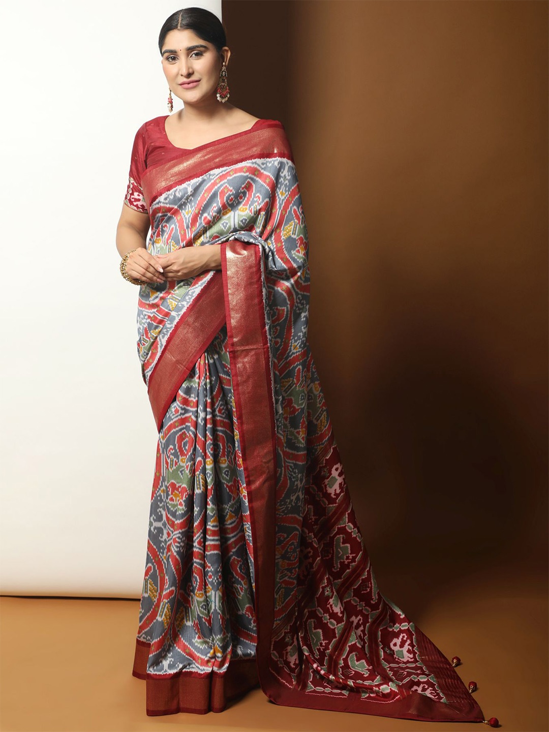 

Phenav Ethnic Motifs Printed Zari Art Silk Patola Saree, Red