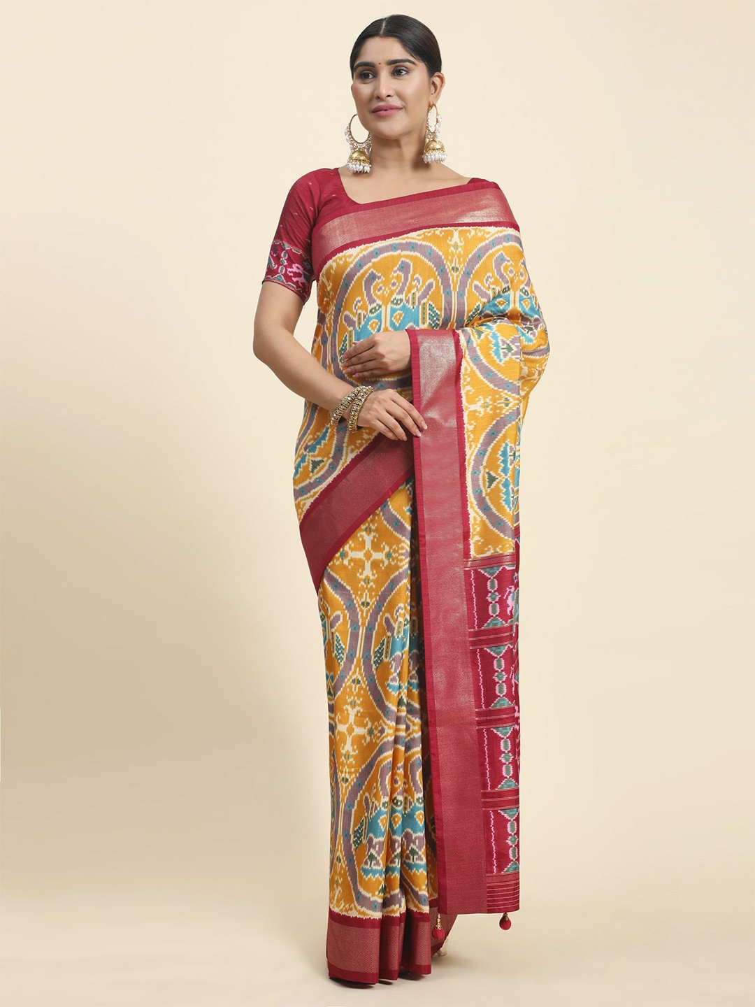 

Phenav Ethnic Motifs Printed Zari Art Silk Patola Saree, Yellow