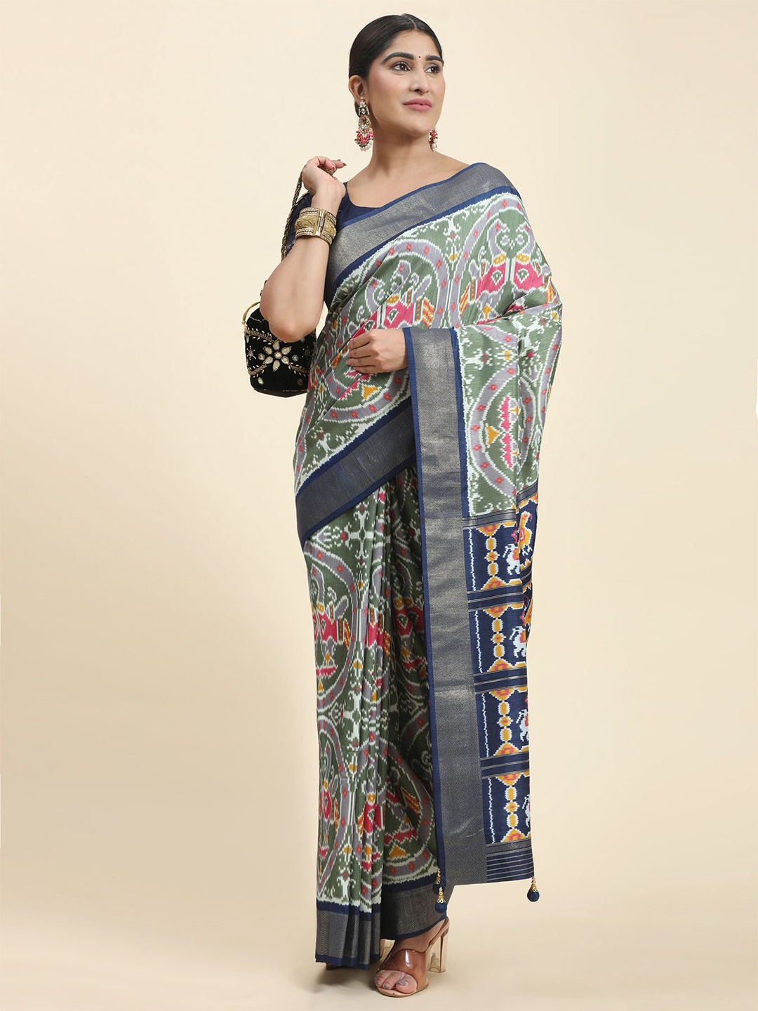 

Phenav Ethnic Motifs Printed Zari Patola Saree, Green