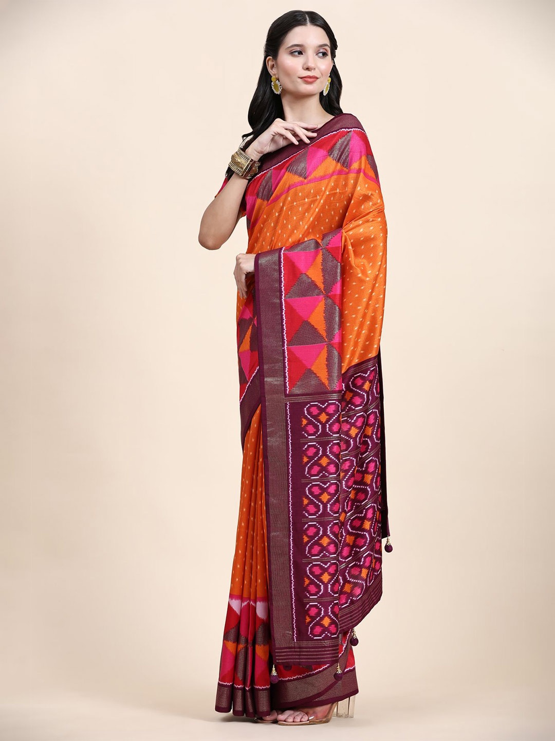 

Phenav Ethnic Motifs Printed Zari Art Silk Patola Saree, Orange
