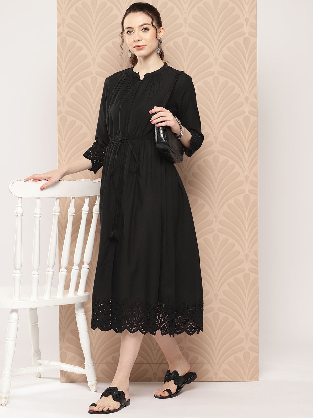 

Janasya Women's Black Cotton Solid Flared Dress