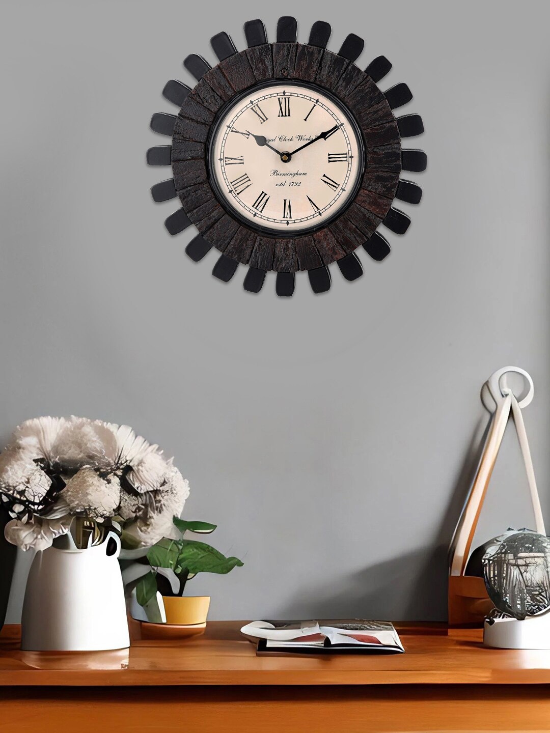 

Aapno Rajasthan Black Textured Analogue Wooden Wall Clock