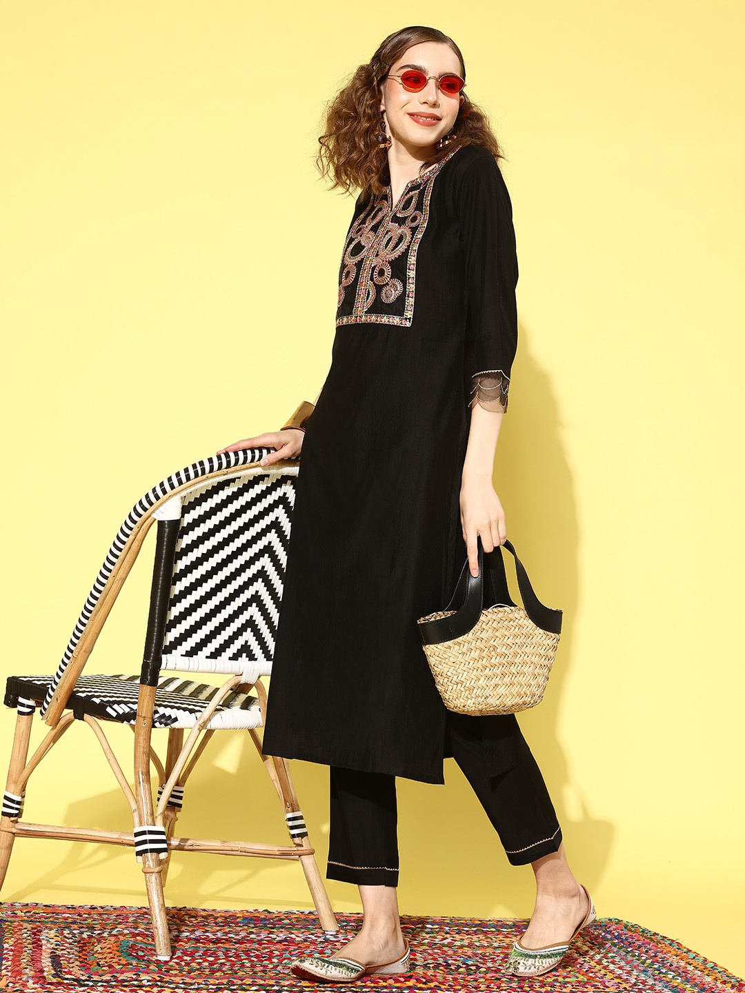 

Sangria Women Floral Embroidered Regular Thread Work Kurta with Trousers, Black