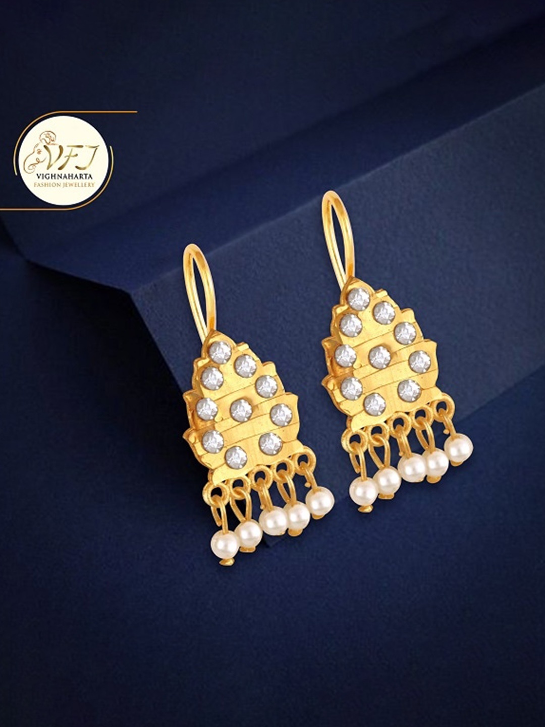 

Vighnaharta Gold-Plated Floral Shaped Drop Earrings