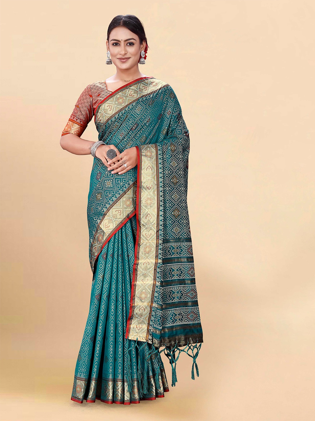 

Mitera Teal & Gold-Toned Woven Design Zari Patola Saree
