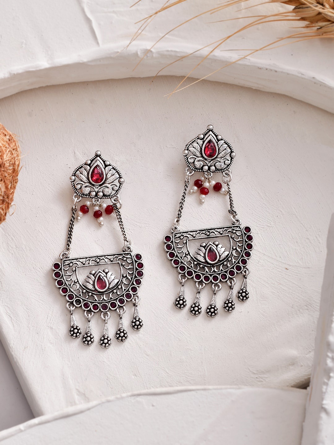 

Voylla Silver-Pleated Teardrop Cut Red Stones Drop Earrings