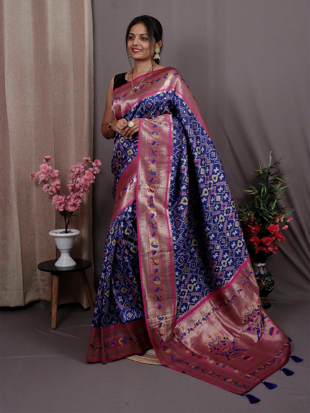 

Mitera Blue & Pink Woven Design Zari Silk Blend Patola Saree