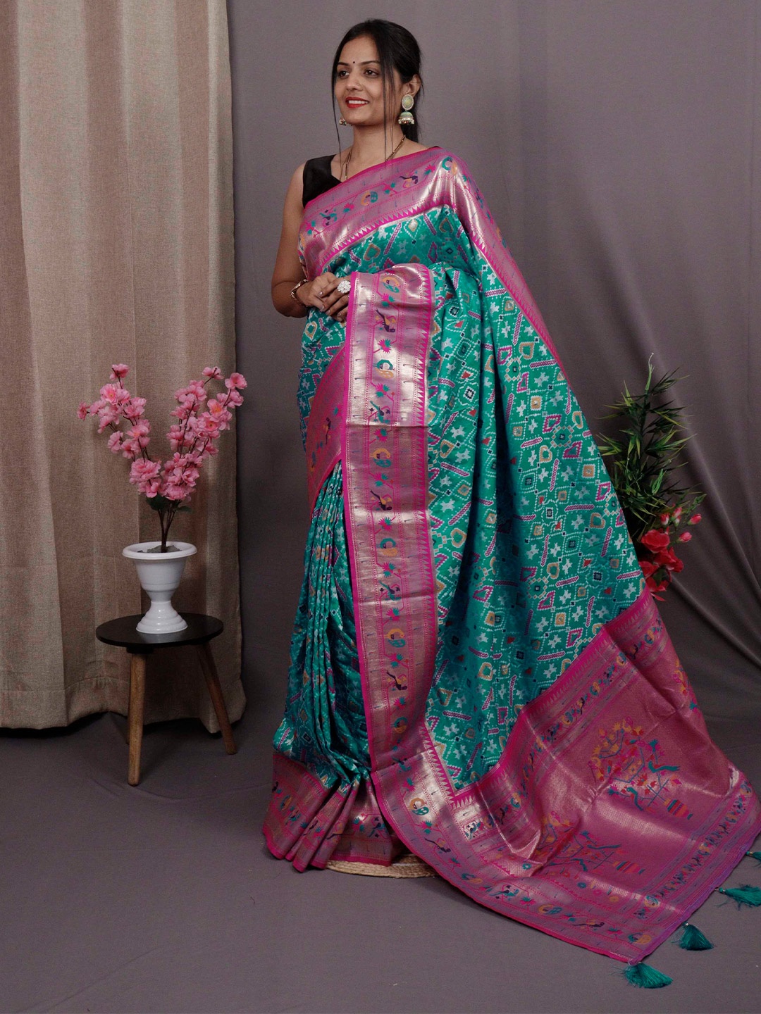 

Mitera Blue & Pink Ethnic Motifs Woven Design Zari Patola Saree