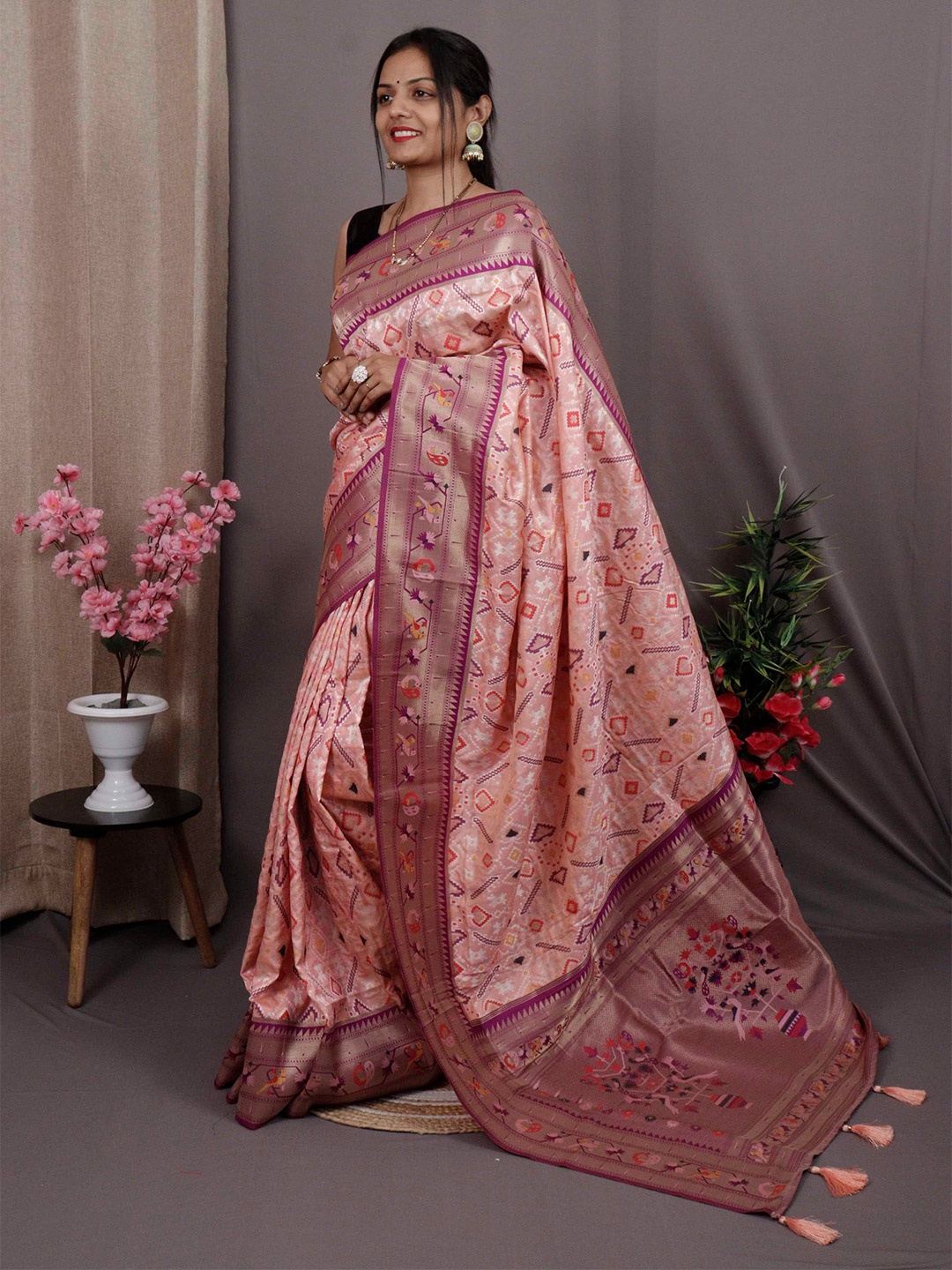 

Mitera Pink & Purple Ethnic Motif Woven Design Zari Patola Saree