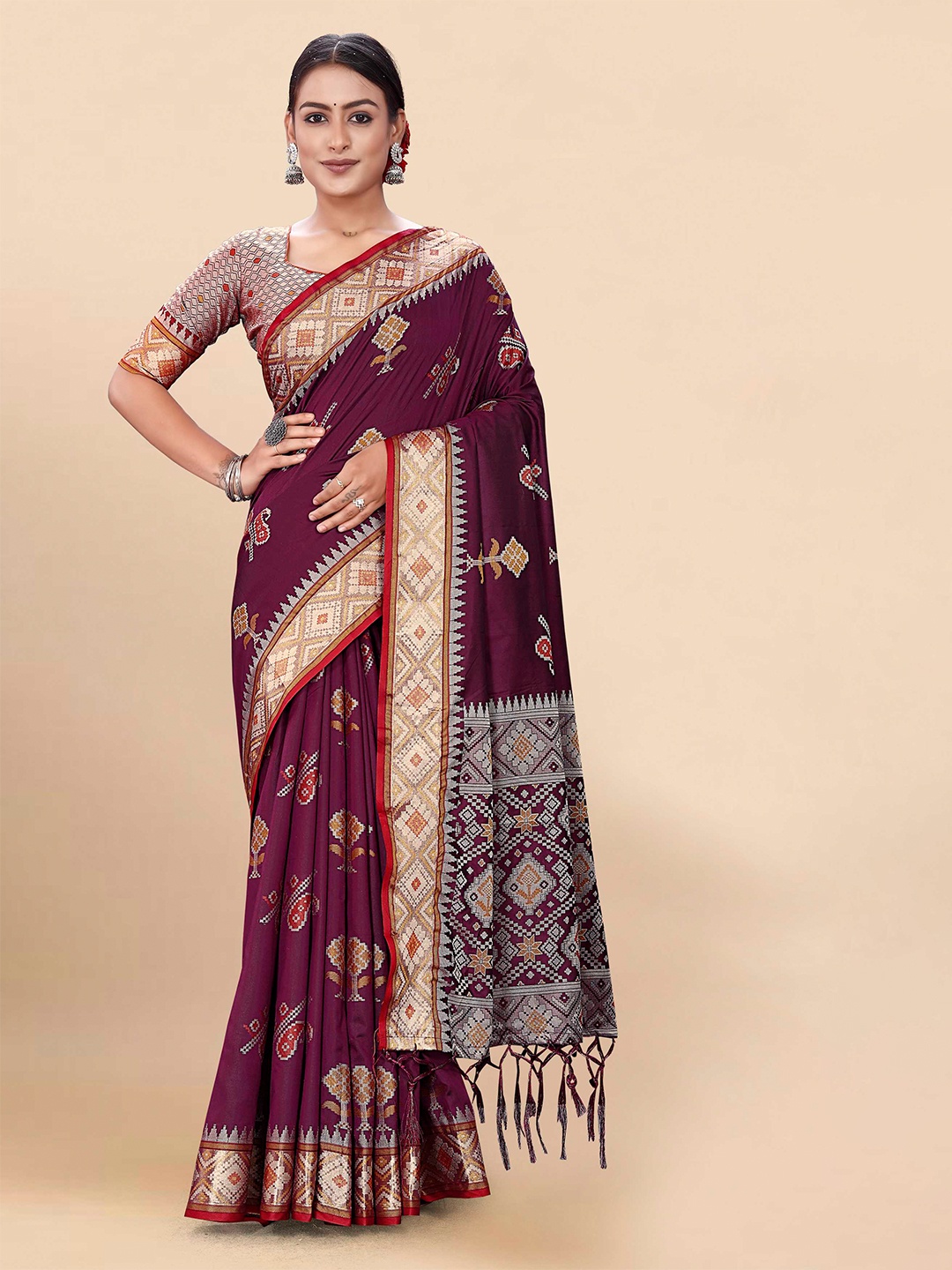 

Mitera Purple & Gold-Toned Ethnic Motifs Woven Design Zari Patola Saree