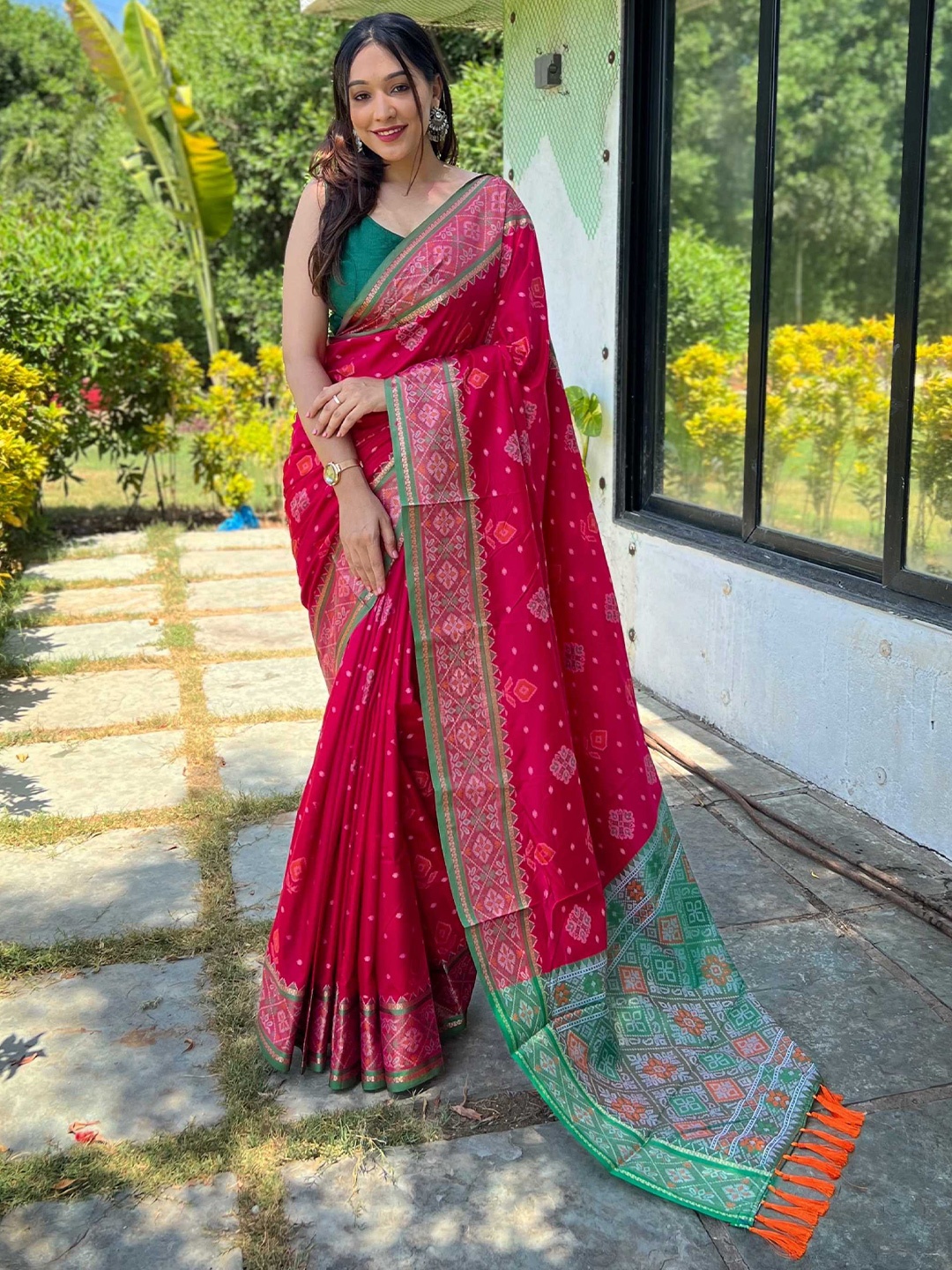 

Mitera Pink & Green Woven Design Zari Patola Saree