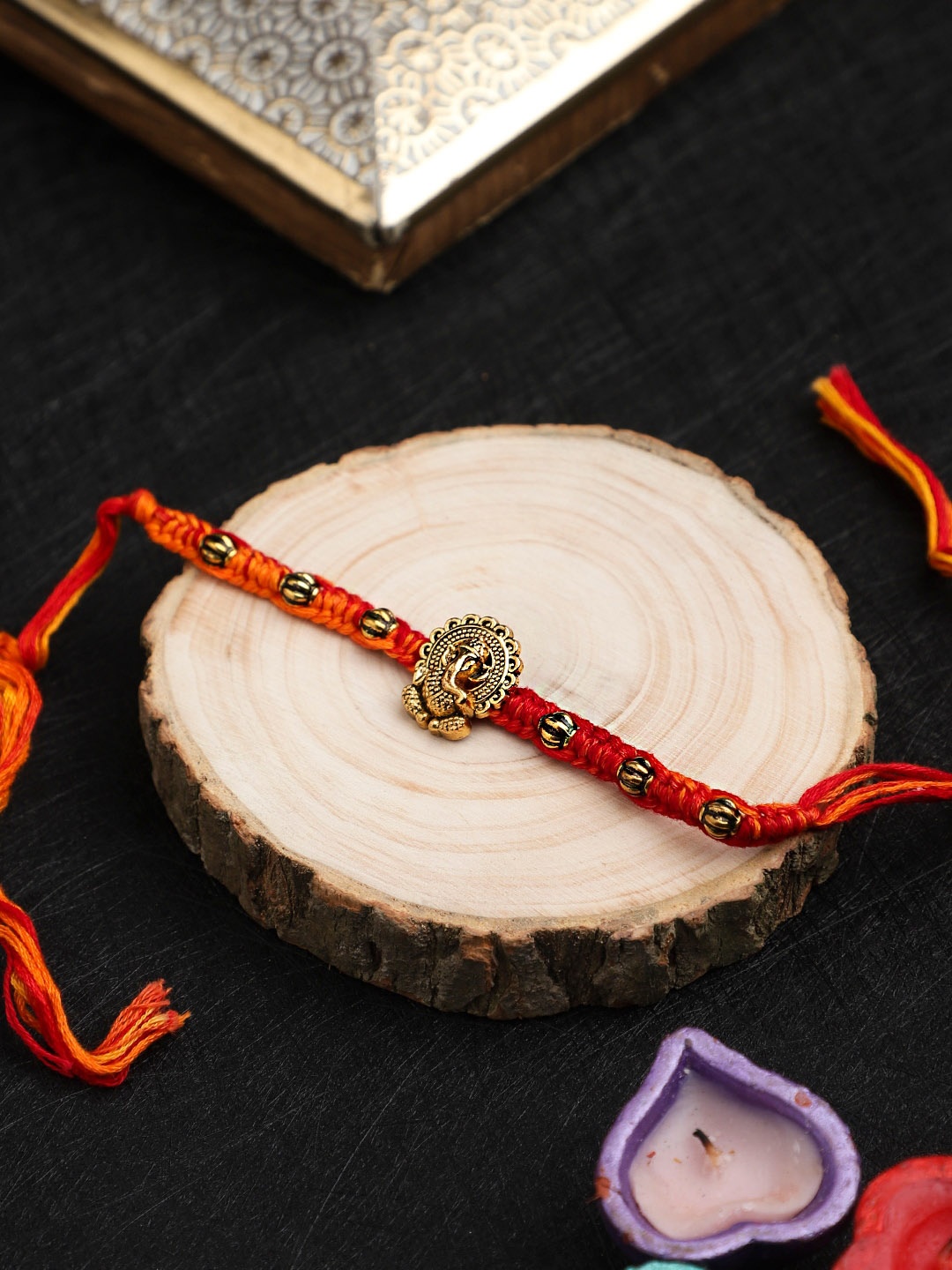 

Mali Fionna Ganesha Charm Beaded Thread Rakhi, Gold