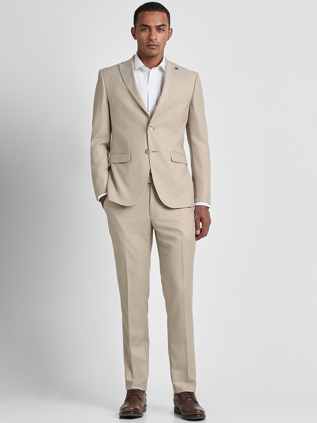 

Peter England Elite Self Design Slim Fit Two Piece Formal Suit, Beige