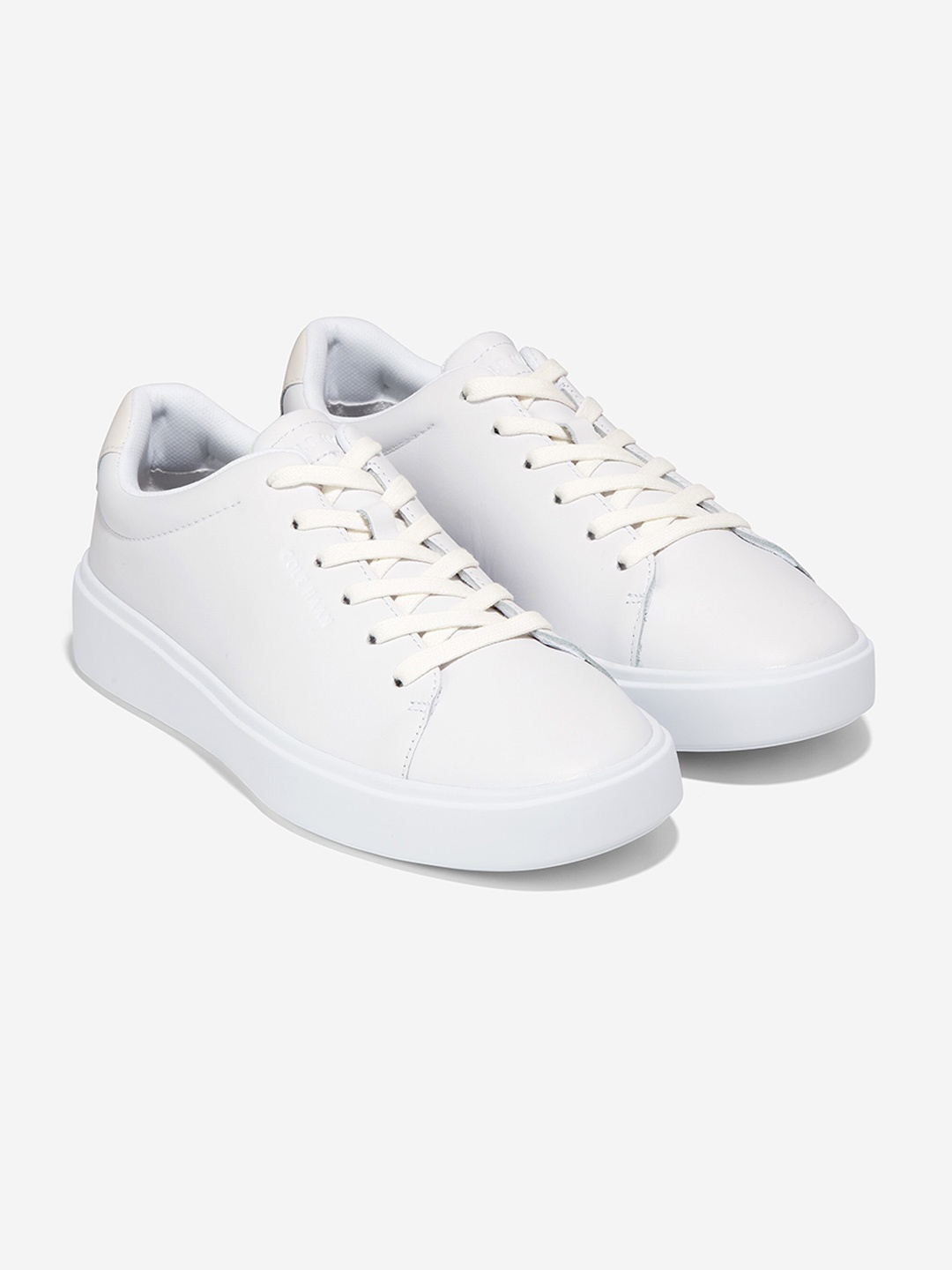 

Cole Haan Men Leather Grand Crosscourt Traveler Sneakers, Off white