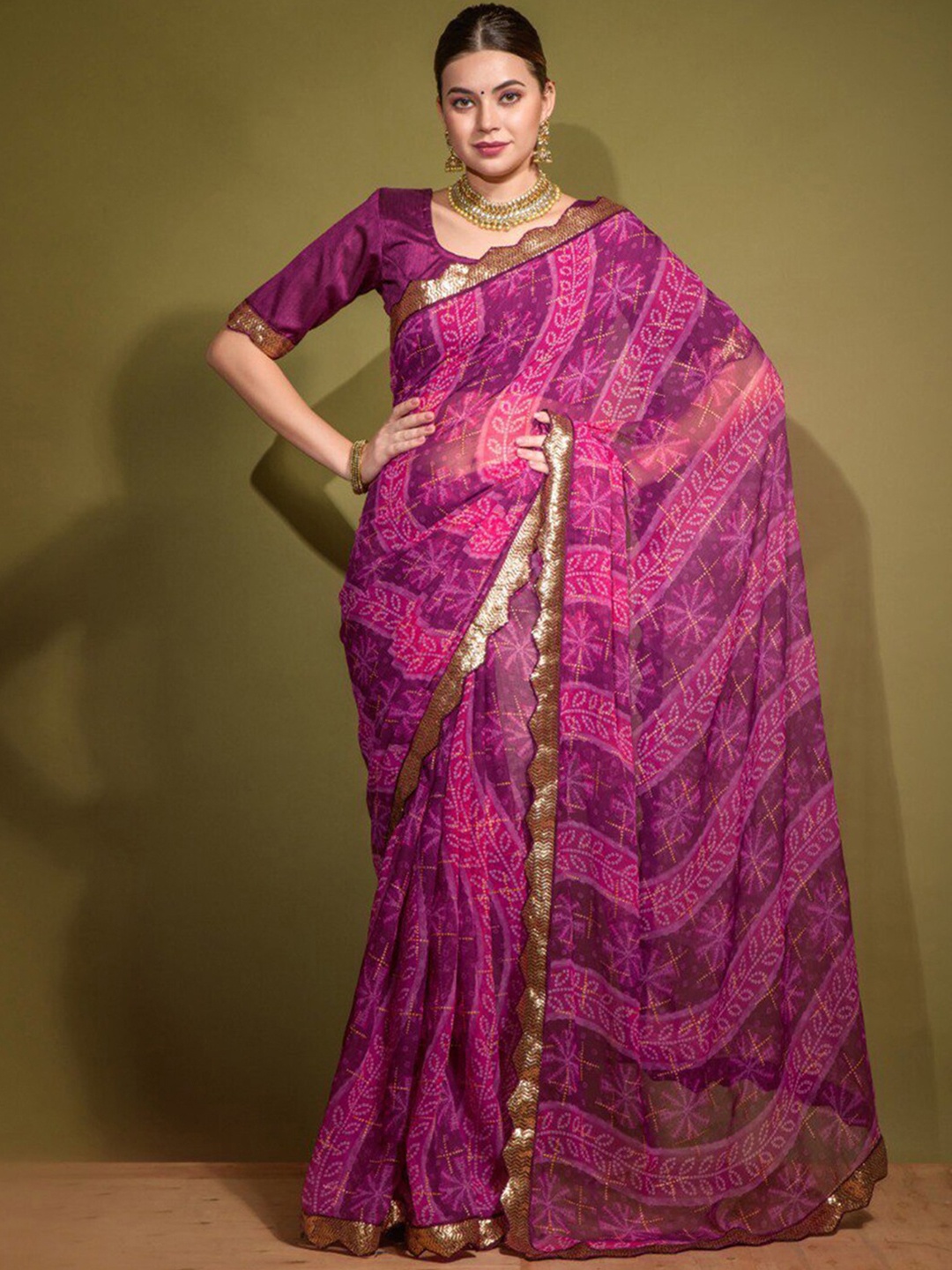 

Mitera Pink & White Bandhani Printed Poly Chiffon Bandhani Saree