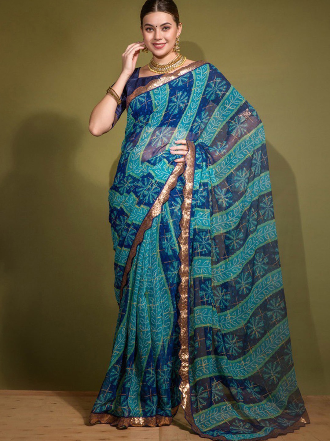 

Mitera Blue & White Bandhani Printed Sequinned Poly Chiffon Bandhani Saree