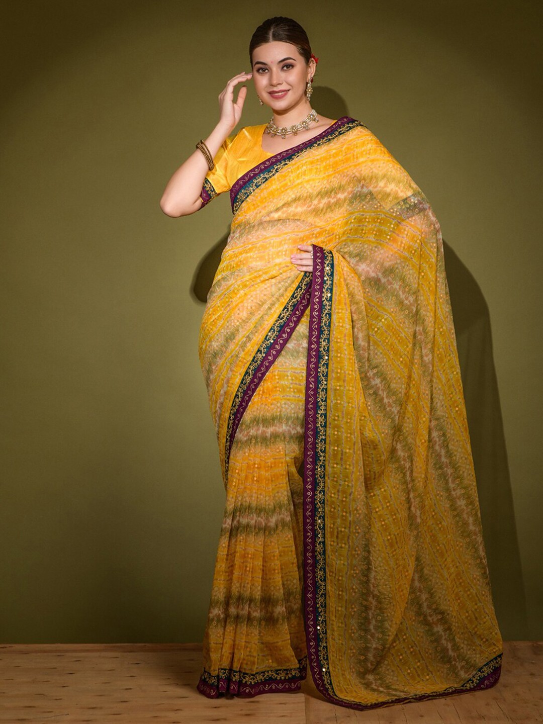 

Mitera Yellow & Red Bandhani Printed Sequinned Poly Chiffon Bandhani Saree
