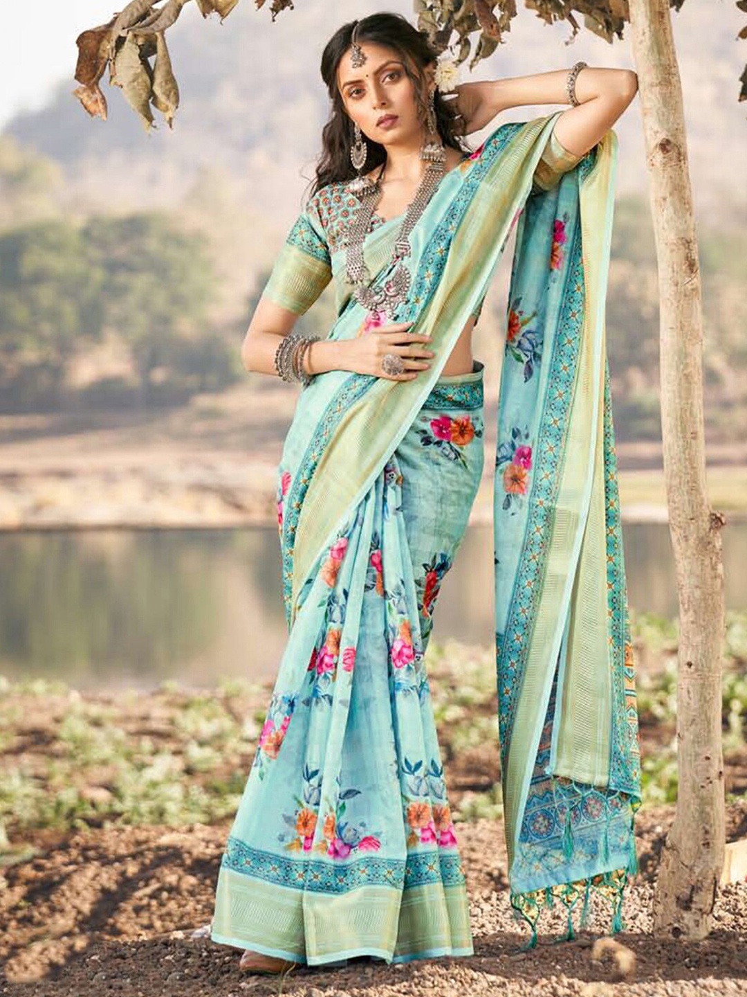 

Mitera Turquoise Blue & Gold-Toned Floral Printed Zari Saree