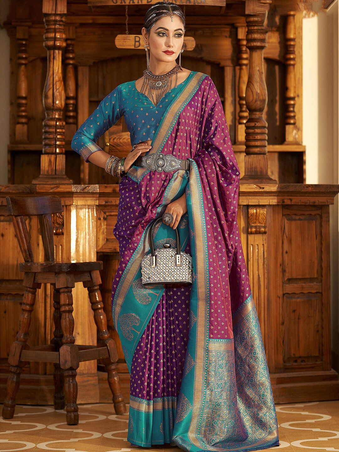 

Mitera Purple & Blue Ethnic Motifs Woven Design Zari Banarasi Saree
